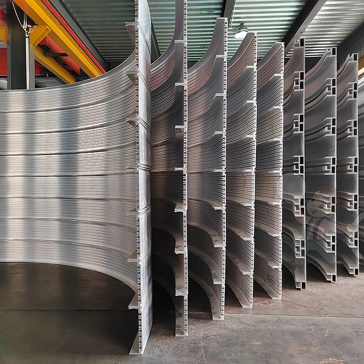 Rotating door profile bending