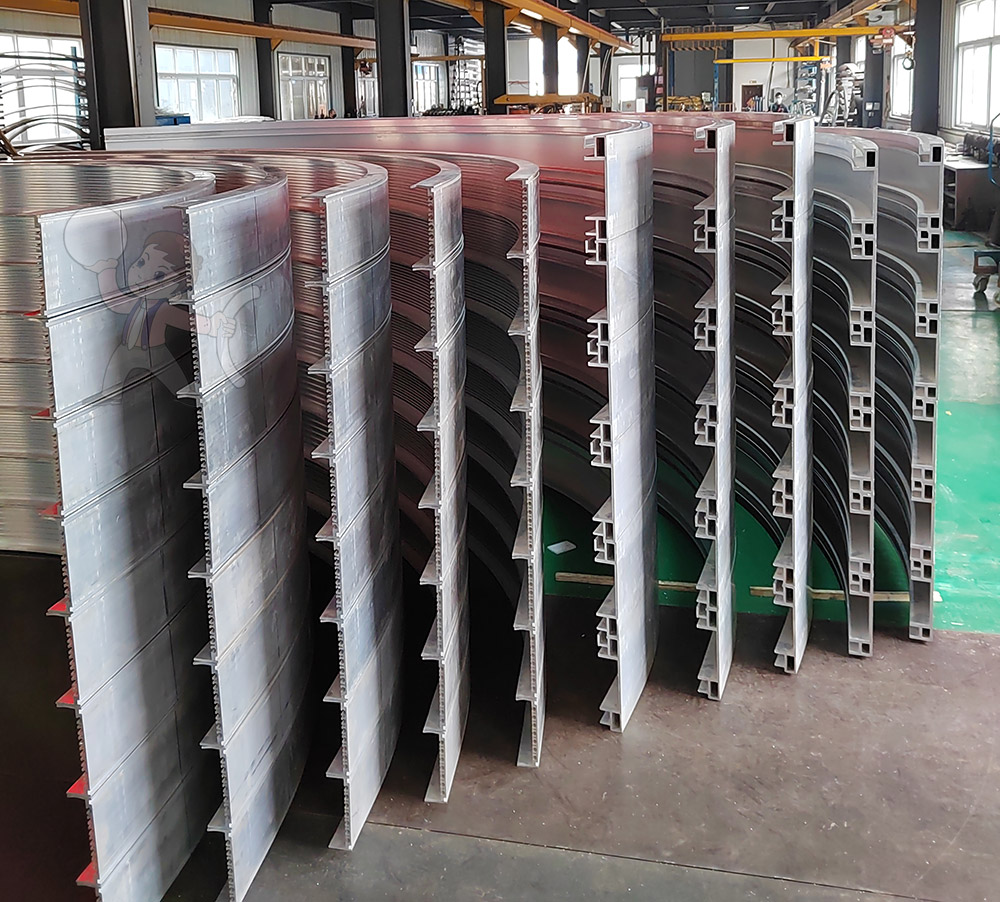 Rotating door profile bending