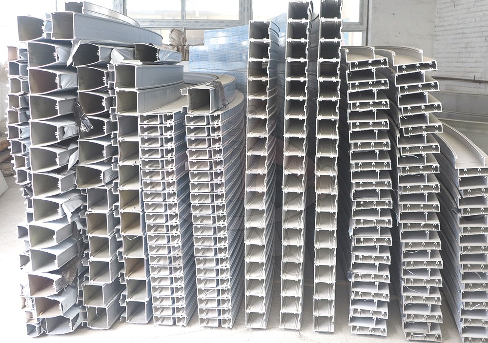 Bending of unit curtain wall profiles