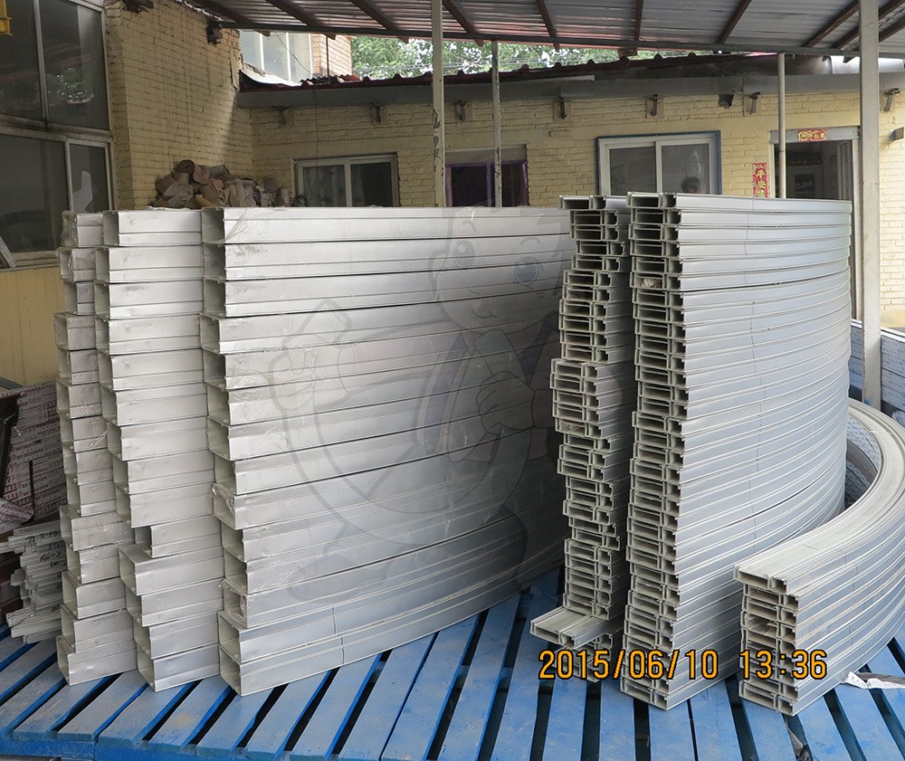 Bending of unit curtain wall profiles